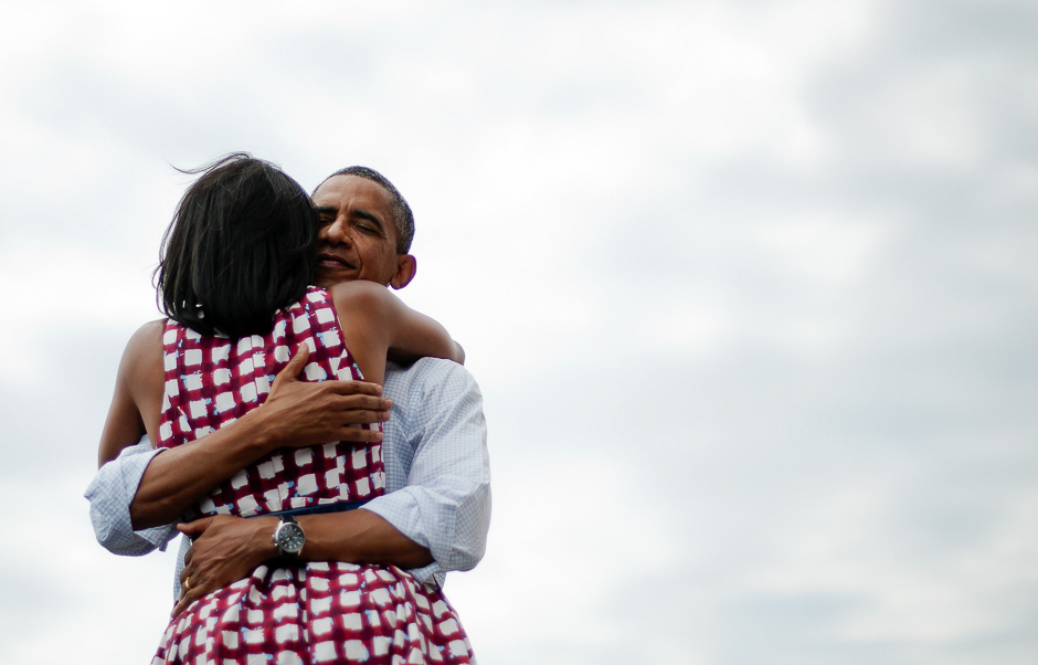 The fascination with the Obamas was global, and this picture of them hugging after a campaign event in Iowa became the most re-tweeted picture in history. PHOTO: AFP