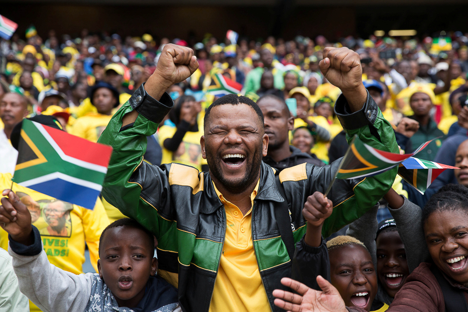 Crowd cheers at a rally to commemorate the 105th birthday of the ruling party African National Congress (ANC) of South African President Jacob Zuma in Soweto, South Africa. PHOTO: REUTERS