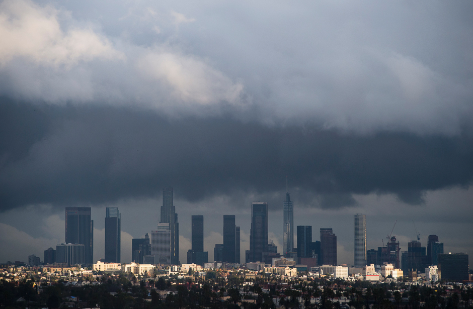 Rain clouds move over downtown Los Angeles, California. PHOTO: AFP