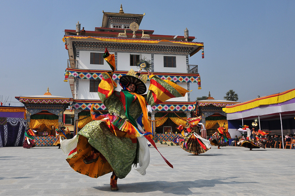 Buddhist monks from Bhutan perform the Black Hat mask dance at the Bhutan temple in Bodhgaya. PHOTO: AFP