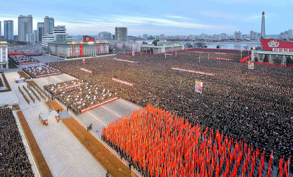 This picture taken on January 5, 2017 and released by North Korea's official Korean Central News Agency (KCNA) on January 6, 2017 shows a mass rally taking place at Kim Il Sung Square in Pyongyang. Thousands of North Koreans have rallied in Pyongyang, chanting communist slogans and vowing support for leader Kim Jong-Un, who in his New Year's message announced plans to test-fire a ballistic missile capable of reaching the US mainland. PHOTO: AFP