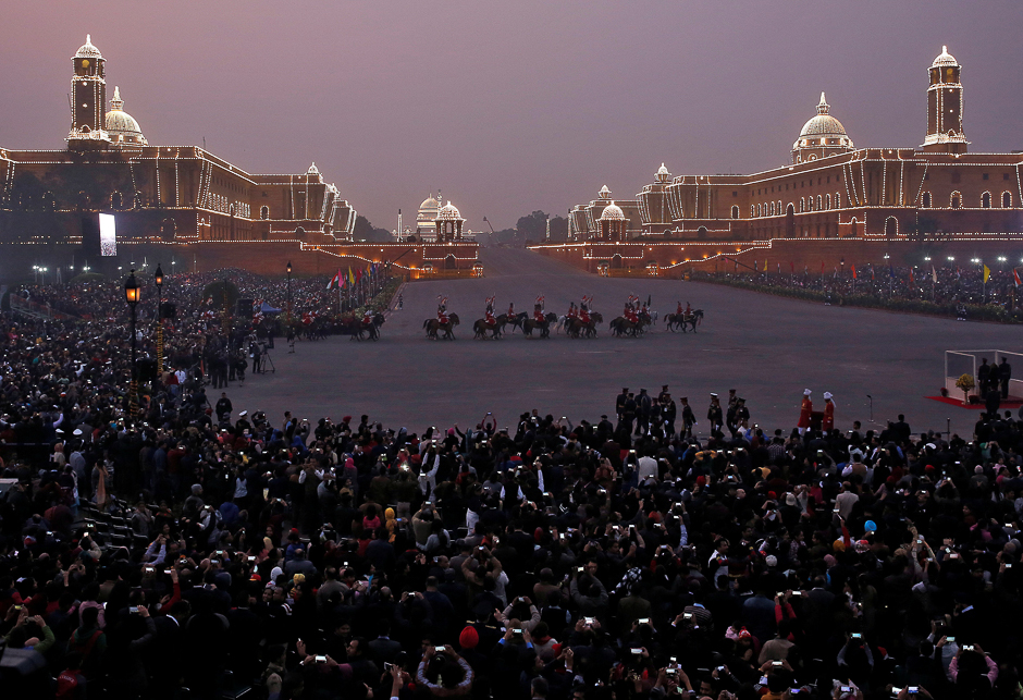 People take pictures of the Beating the Retreat ceremony in New Delhi, India. PHOTO: REUTERS