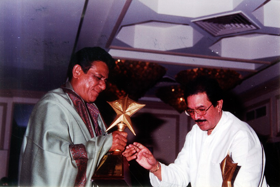 Actor Om Puri being felicitated by Rajesh Khanna. Express archive photo