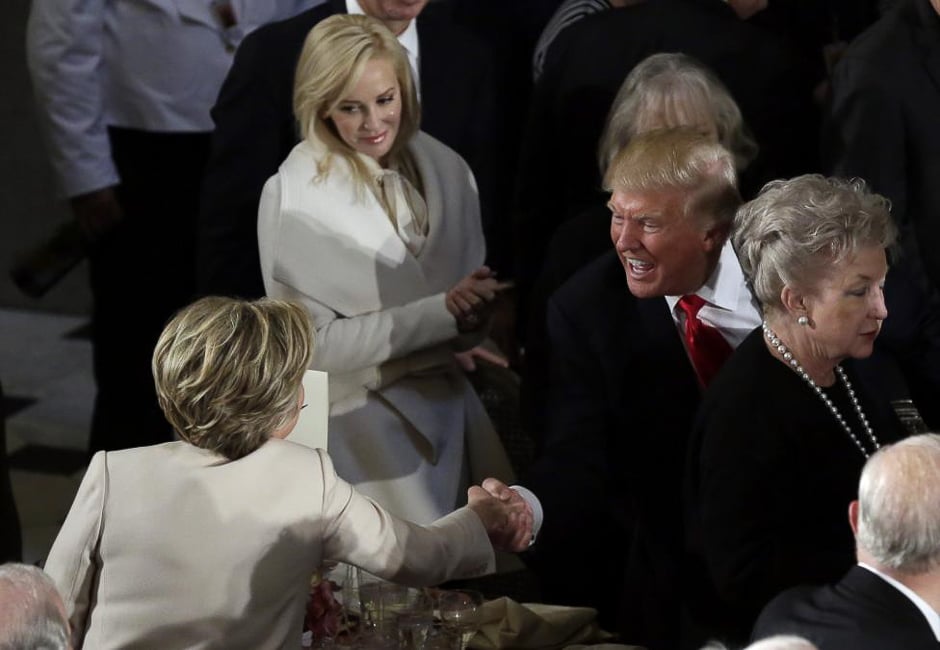President Trump shakes hands with Hillary Clinton during the Inaugural Luncheon on Capitol Hill. PHOTO: REUTERS 