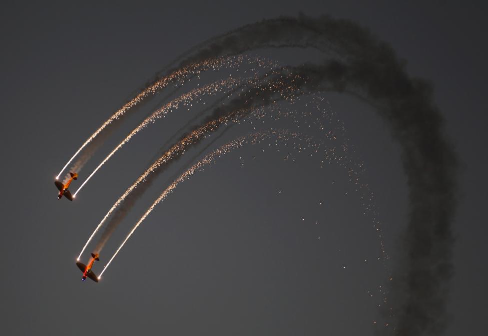 BAHRAIN: DHL's Twisters & Extra 300 perform during the second day of the Bahrain Air Show 2016 at Sakhir, south of Bahrain January 22, 2016. PHOTO: REUTERS