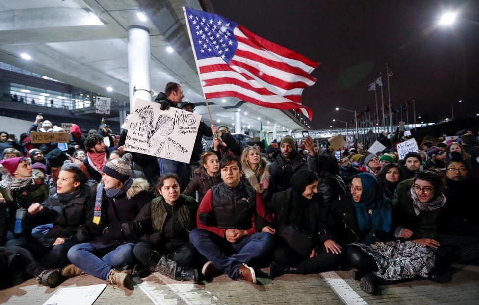 People gather to protest against the travel ban imposed by U.S. President Donald Trump's executive order, at O'Hare airport in Chicago. REUTERS/Kamil Krzaczynski