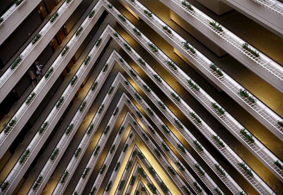 SINGAPORE: People walk in the corridor of the Pan Pacific Hotel in Singapore, February 21, 2016. REUTERS/Edgar Su
