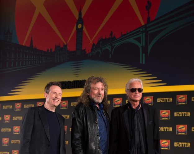 In this file picture taken on September 21, 2012 British rock band Led Zeppelin's (L-R) John Paul Jones, Robert Plant and Jimmy Page pose at a press conference to announce the release of a video recording of their one-off 2007 concert in London. PHOTO: AFP