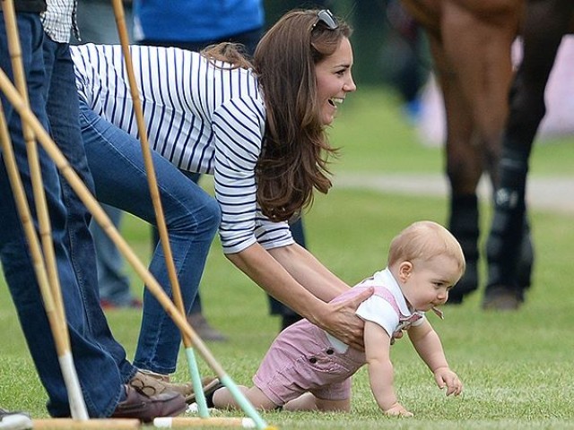 #DAY2: The future king showed up with mom Kate Middleton to cheer on his dad, Prince William, in a polo match on Sunday, reported People magazine. Prince George looked absolutely adorable in red dungarees with a white polo-shirt. He totally owned the look as he tried chasing after a ball, took a few wobbly steps and even tried to crawl for it away from Mommy Middleton.