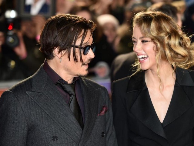 File photo of actors Johnny Depp and Amber Heard. PHOTO: AFP