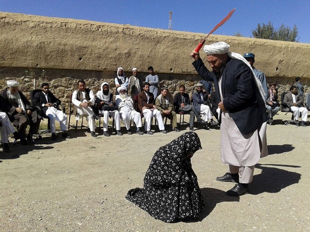 Image result for afghan beating of woman