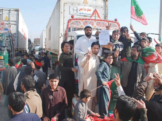 gt road blocked at shahiya toll plaza long queues form on hattar taxila road photo express