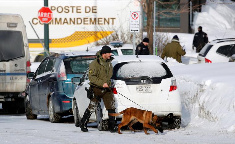 police officers patrol the perimeter at the scene of a fatal shooting at the quebec islamic cultural centre in quebec city canada january 30 2017 photo reuters