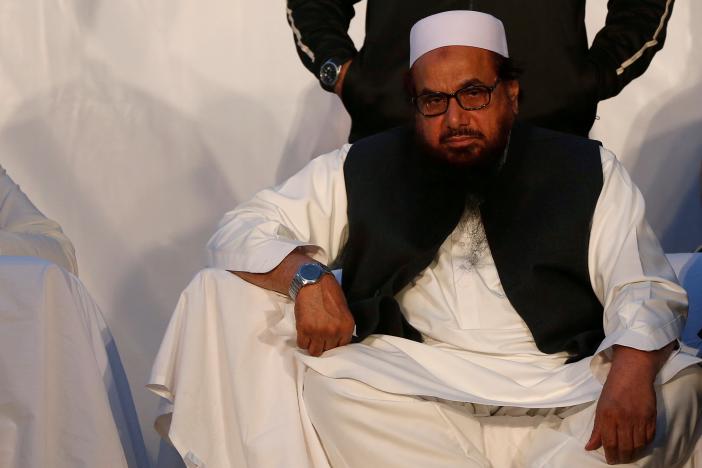 hafiz muhammad saeed chief of the islamic charity organisation jamaat ud dawa jud sits during a rally against india and in support of kashmir in karachi pakistan december 18 2016 photo reuters