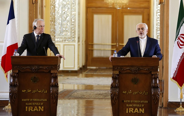 french foreign minister jean marc ayrault l and iranian foreign minister mohammad javad zarif give a press conference following their meeting in tehran on january 31 2017 photo afp