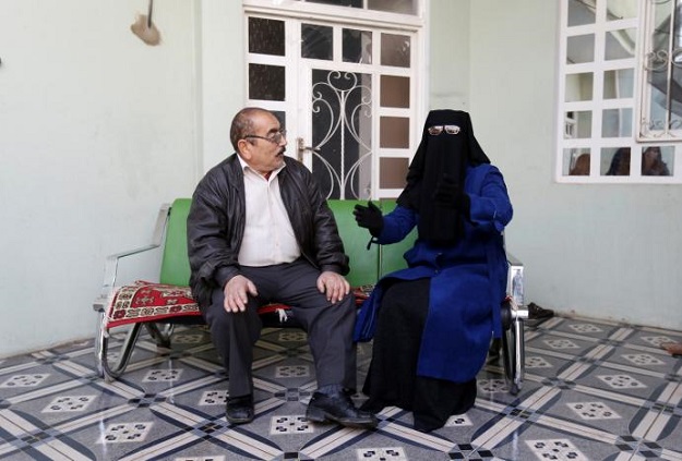 Abu Ahmed and his wife Umm, a Muslim couple who bought Yazidi boy Ayman from Islamic State militants in Mosul, speak during an interview with Reuters in Rashidiya, north of Mosul, Iraq, January 30, 2017. PHOTO: REUTERS