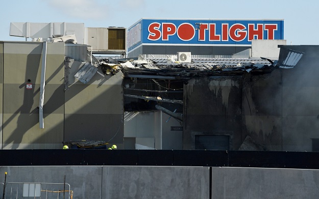  The scene where a light plane crashed into the back of a building at Essendon airport in Melbourne, Australia, February 21, 2017. PHOTO: REUTERS