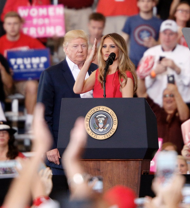 First Lady Melania Trump salutes the crowd after introducing her husband, US President Donald Trump at the start of a rally at the Orlando Melbourne International Airport on February 18, 2017 in Melbourne, Florida. PHOTO: AFP