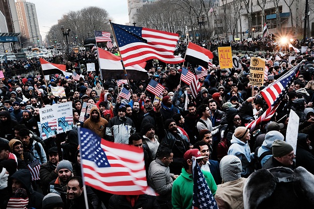 Yemenis and supporters protest against President Donald Trump's executive order temporarily banning immigrants and refugees from seven Muslim-majority countries, including Yemen on February 2, 2017 in the Brooklyn borough of New York City. PHOTO: AFP