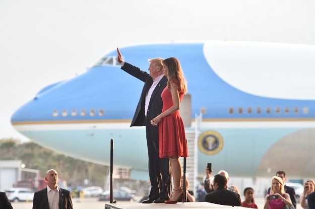 US President Donald Trump and First Lady Melania Trump arrive for a rally on February 18, 2017 in Melbourne, Florida. PHOTO: AFP