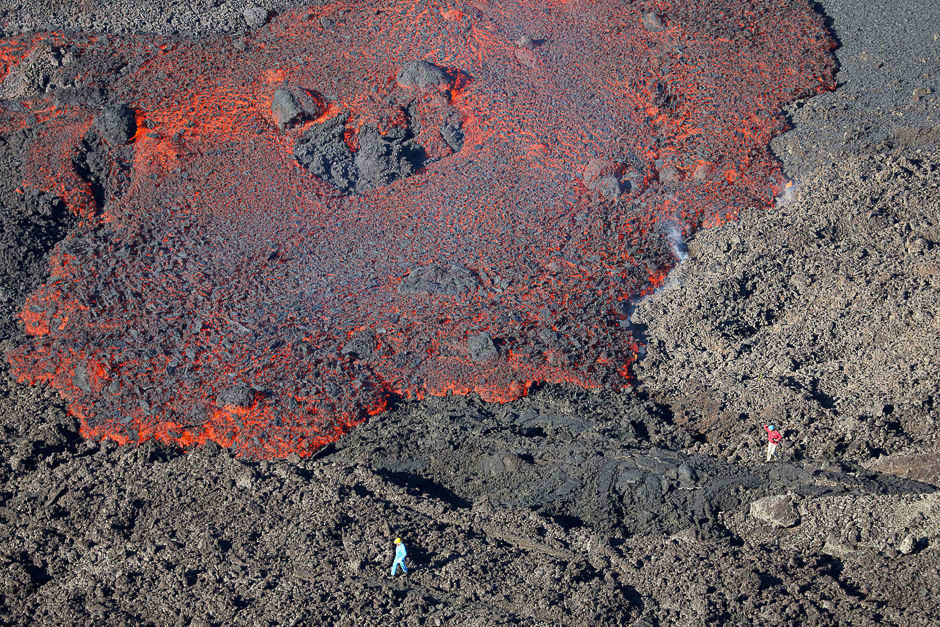 An aerial view shows lava flowing down the Piton de la Fournaise volcano on the French island of La Reunion in the Indian Ocean. PHOTO: AFP