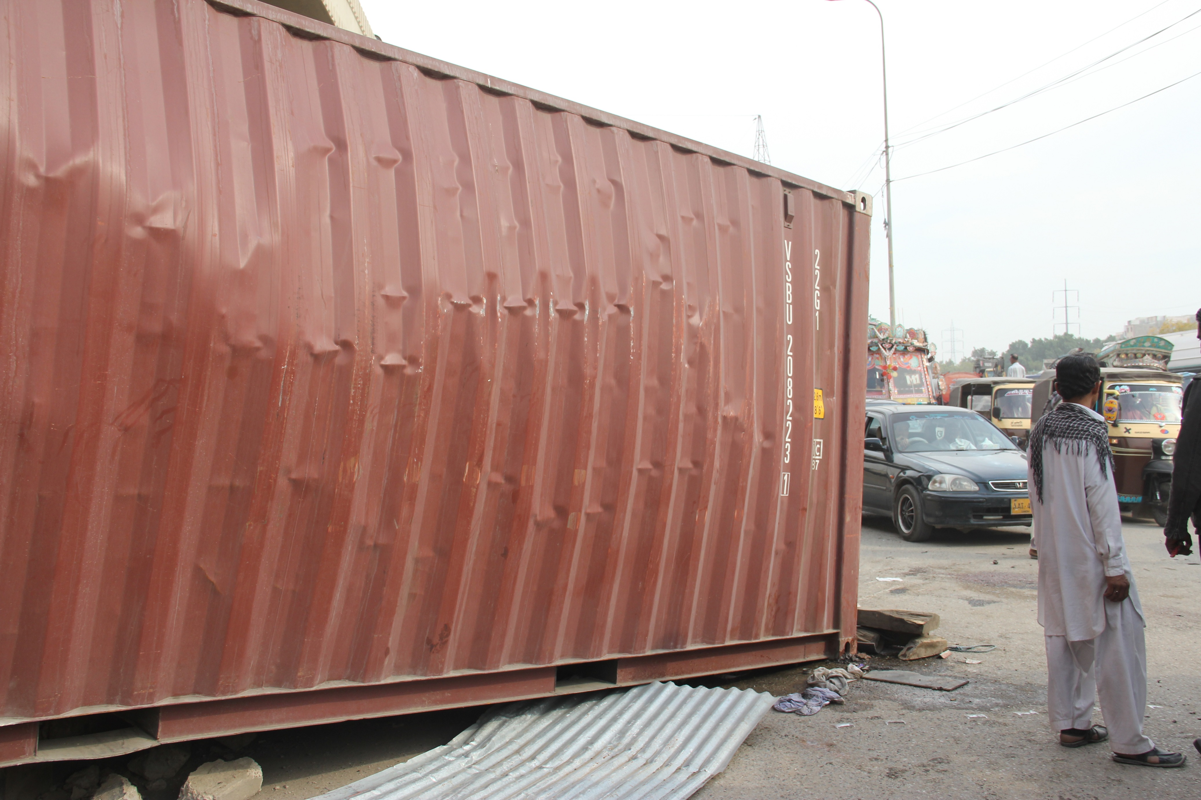 this container was on the truck that overturned near qayyumabad roundabout and killed three people on thursday afternoon photo ayesha mir express