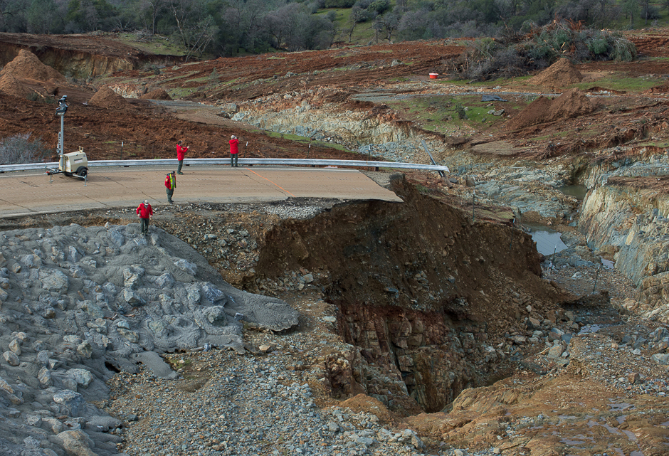 California Department of Water Resources crews inspect and evaluate the erosion just below the Lake Oroville Emergency Spillway site after lake levels receded, in Oroville, California, US. PHOTO: REUTERS