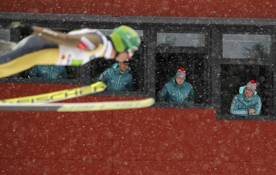 Judges watch Hannu Manninen of Finland in action during the FIS Nordic Ski World Championships, Lahti, Finland PHOTO: REUTERS