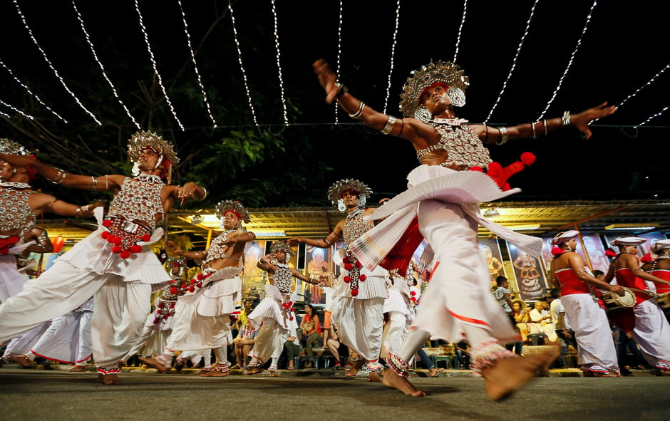 Traditional dancers perform during the annual Nawam Perahera (street pageant) in Colombo. PHOTO: REUTERS