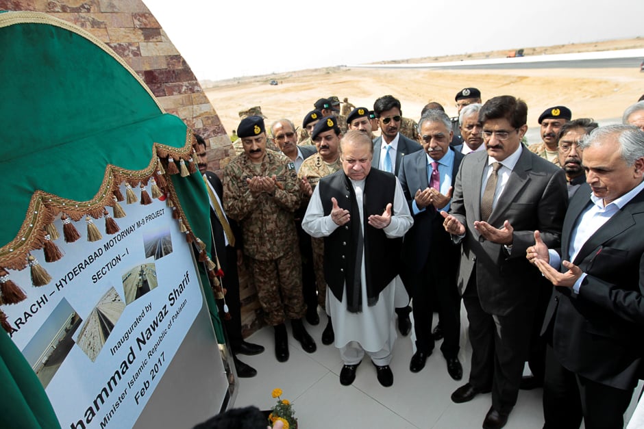 Prime Minister Nawaz Sharif (C) attends a ceremony to inaugurate the M9 motorway between Karachi and Hyderabad, near Hyderabad. PHOTO: REUTERS