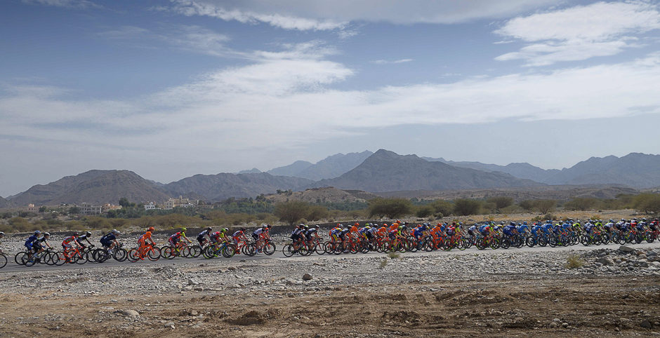 The peloton rides during the first stage of the 8th edition of the cycling Tour of Oman between al-Sawadi Beach and Naseem Park. PHOTO: AFP
