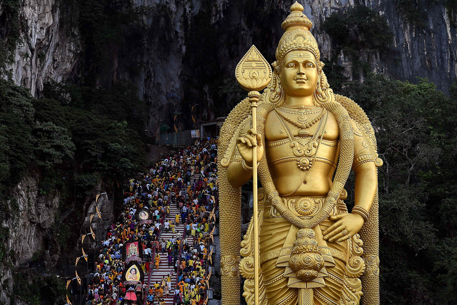 Malaysian Hindu devotees walk up the 272 stairs to the Batu Caves temple during the Thaipusam festival celebrations in Kuala Lumpur. PHOTO: AFP