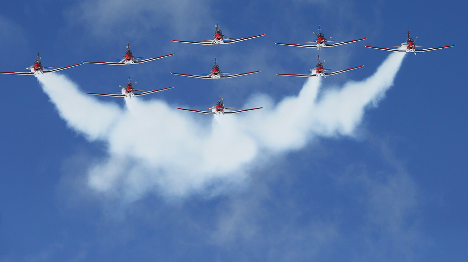 Members of the Swiss aerobatic team Patrouille Swiss fly in formation over the valley of St. Moritz during an airshow for the FIS Alpine World Skiing Championships in St. Moritz, Switzerland. REUTERS