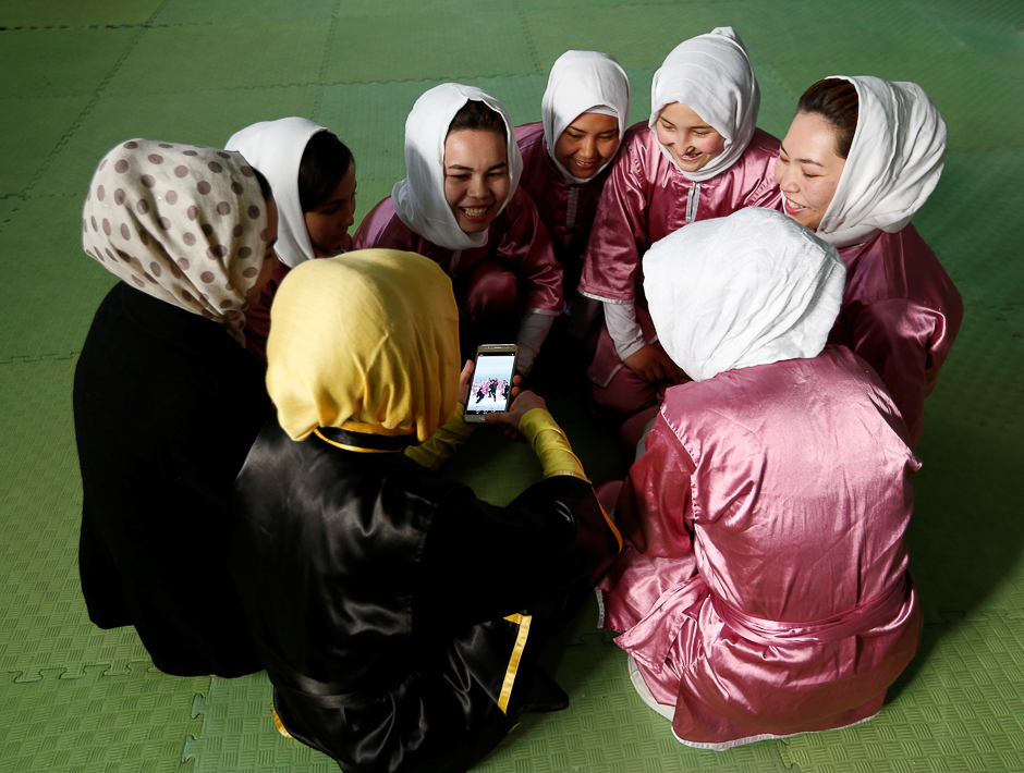 Students chat before an exercise. PHOTO: REUTERS
