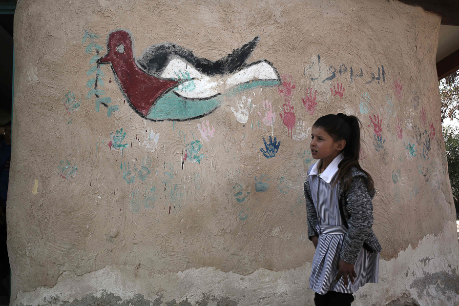 A Palestinian Bedouin school girl walks at her school in the village of Khan al-Ahmar in the Israeli-occupied West Bank. PHOTO: AFP