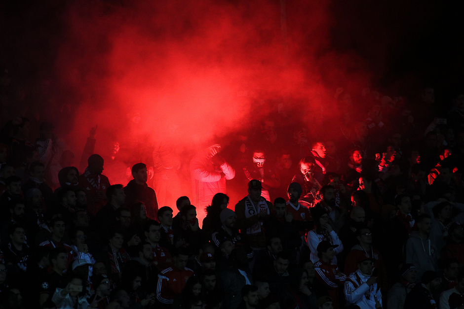 Benfica fans light flares during the Portuguese league football match Vitoria Setubal vs SL Benfica at the Bonfim stadium in Setubal. PHOTO: AFP