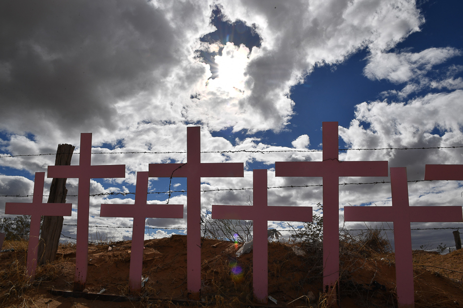 Crosses placed in memory of eight victims of feminicide which were found at Lomas del Poleo are pictured on in Ciudad Juarez, Chihuahua state, Mexico. PHOTO: AFP
