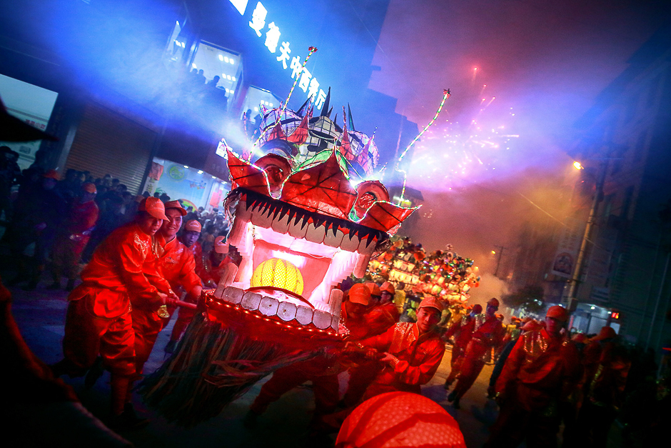 People perform with a long dragon lantern as they celebrate the Chinese Lunar New Year, in Longyan, Fujian province. PHOTO: REUTERS