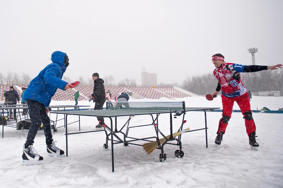 Participants take part in the first Russian ice skating table tennis championships in Lyubertsy, in Moscow. PHOTO: AFP