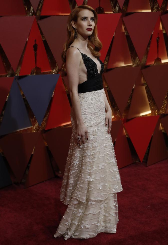 Actress Emma Roberts wears vintage Armani. REUTERS/Mario Anzuoni