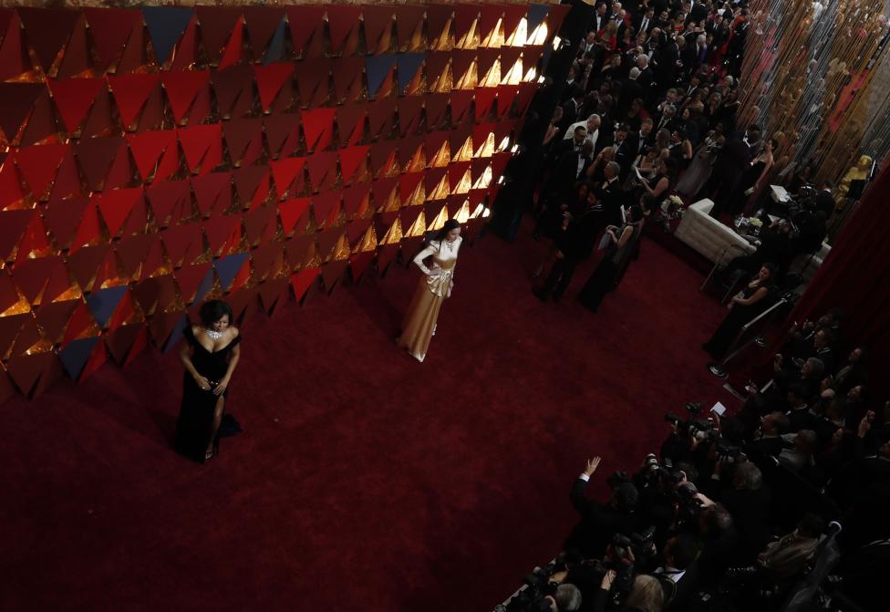 Dakota Johnson and Taraji P. Henson arrive. REUTERS/Mario Anzuoni