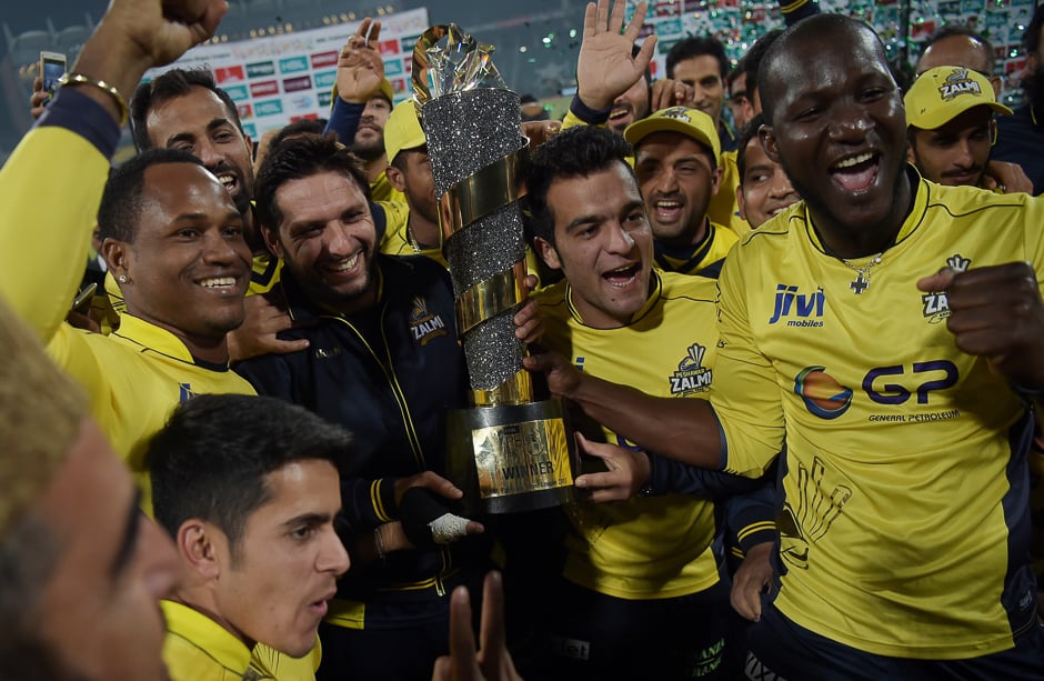 Cricketers of Peshawar Zalmi their victory over Quetta Gladiators. PHOTO: AFP