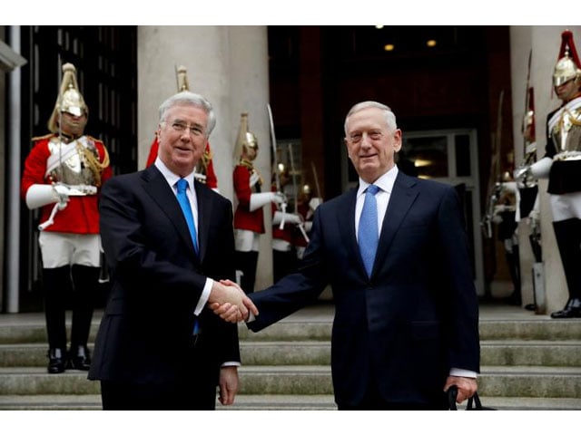 us defence secretary james mattis and britain 039 s defence secretary michael fallon pose for a handshake in front of a ceremonial guard of the household cavalry mounted regiment as mattis arrives for their meeting at the ministry of defence in london march 31 2017 photo reuters