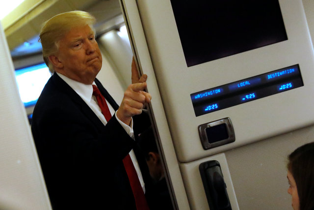 u s president donald trump speaks to reporters aboard air force one as they approach joint base andrews maryland u s march 15 2017 reuters jonathan ernst