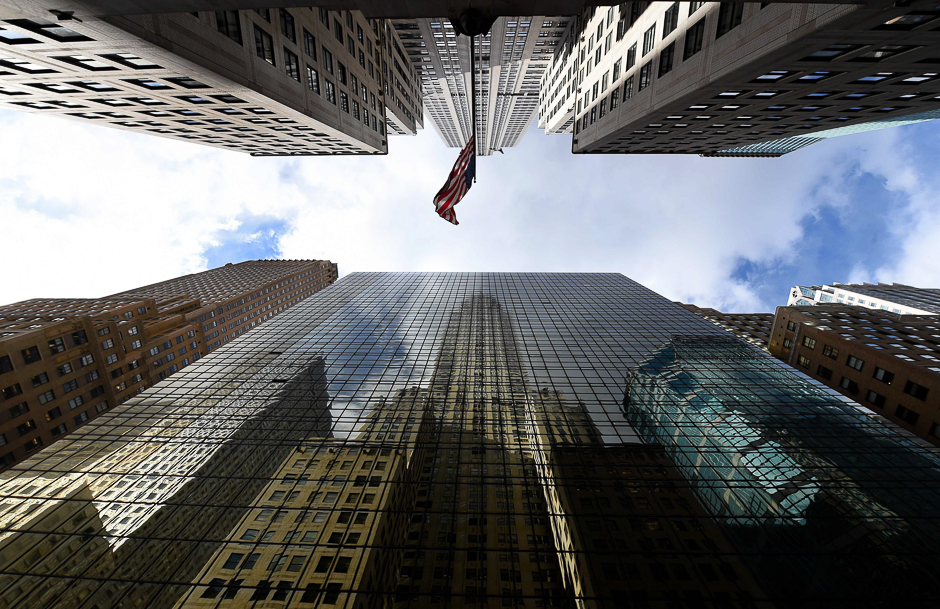 The Chrysler Building is reflected in the side of the Grand Hyatt Hotel in midtown Manhattan. PHOTO: AFP