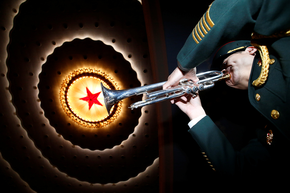 A military band member prepares ahead of the closing session of China's National People's Congress (NPC) at the Great Hall of the People in Beijing, China. PHOTO: REUTERS