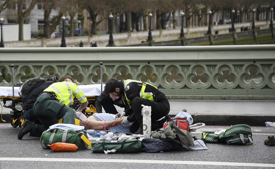 Paramedics treat an inured person after the incident. PHOTO: REUTERS
