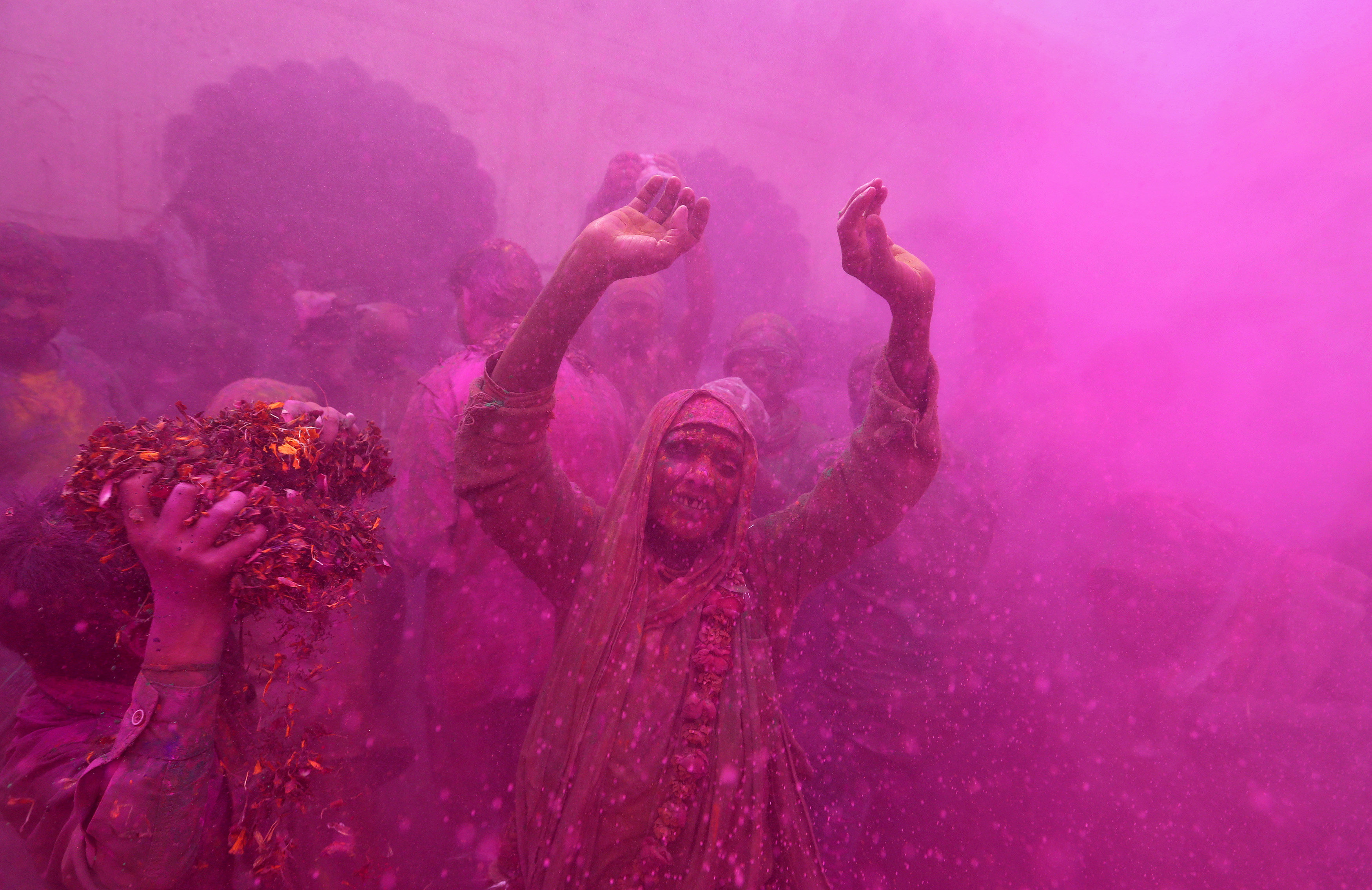 Widows take part in Holi celebrations in the town of Vrindavan in the northern state of Uttar Pradesh, India PHOTO: REUTERS