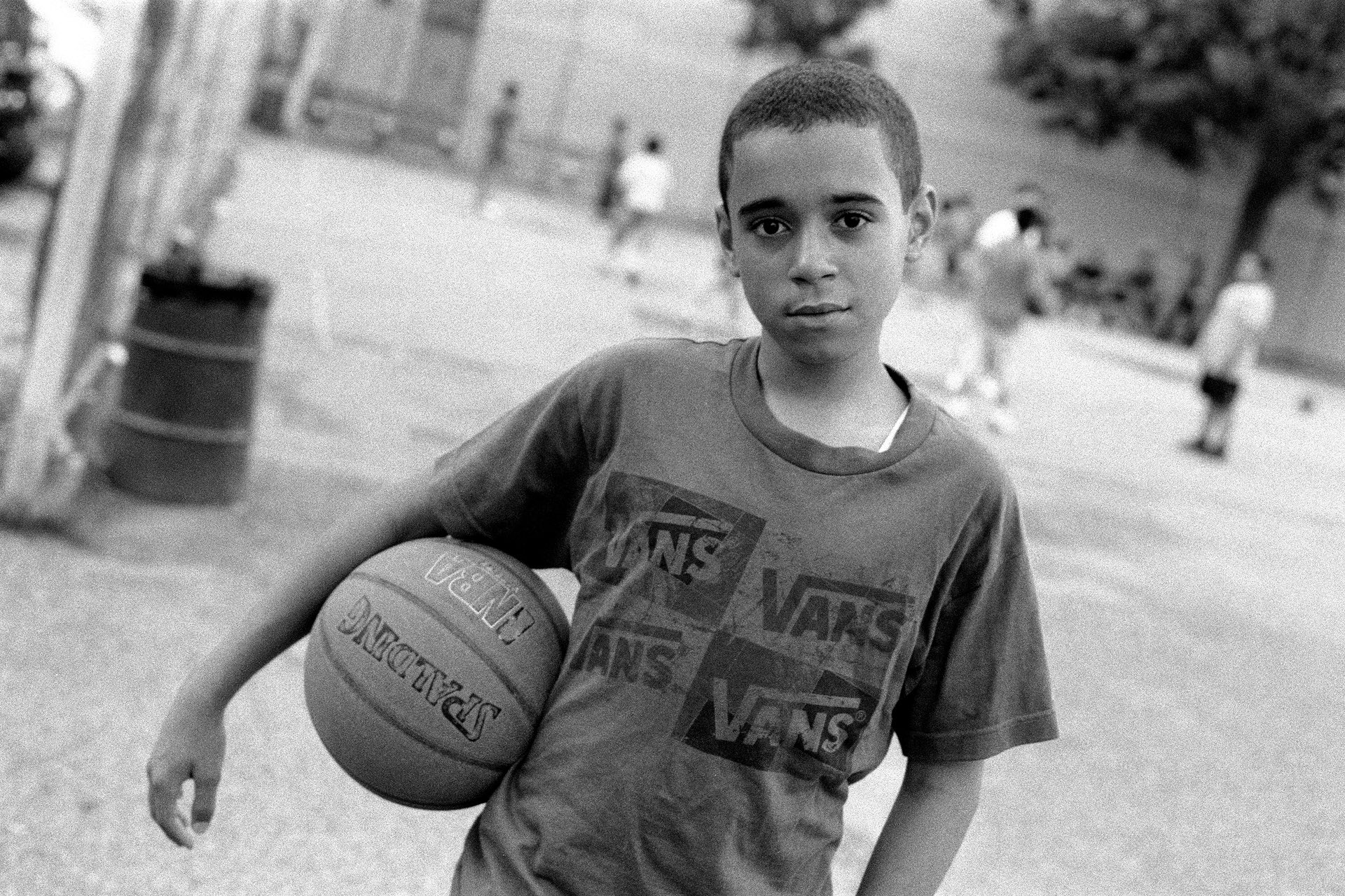 Young basketball player in the park before Friday prayers, Brooklyn, 2011. PHOTO: ROBERT GERHARDT