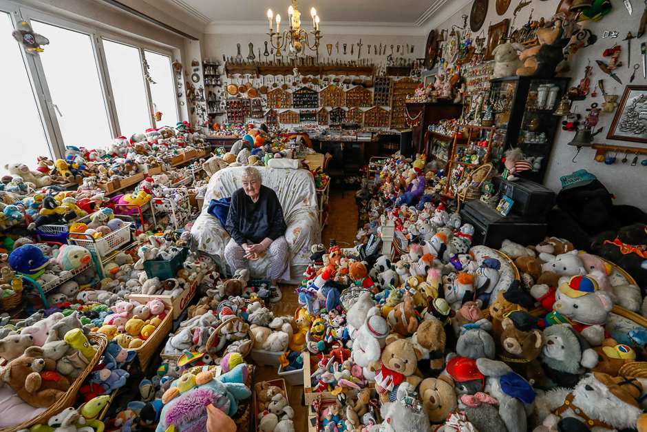 Belgian Catherine Bloemen, 86, sits among more than 20,000 stuffed and plastic toys, she is collecting for more than 65 years, in her house in Brussels, Belgium. PHOTO: REUTERS